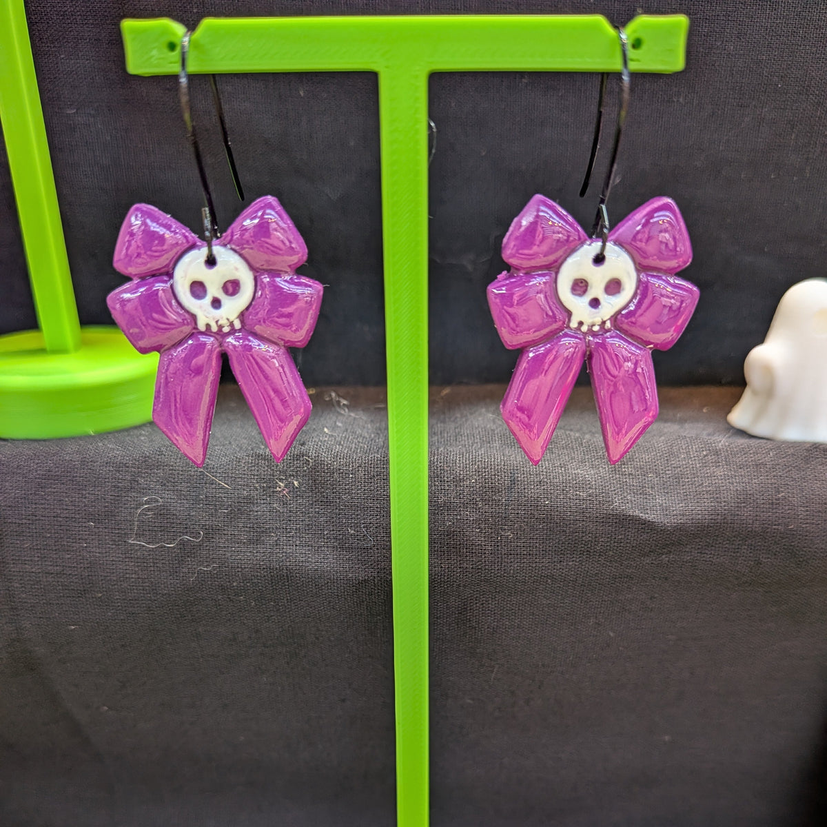 Skull bow earrings